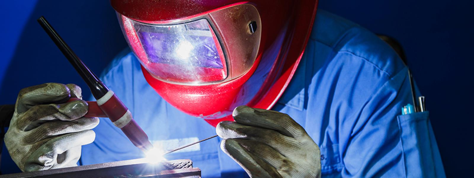 A welder working on a project